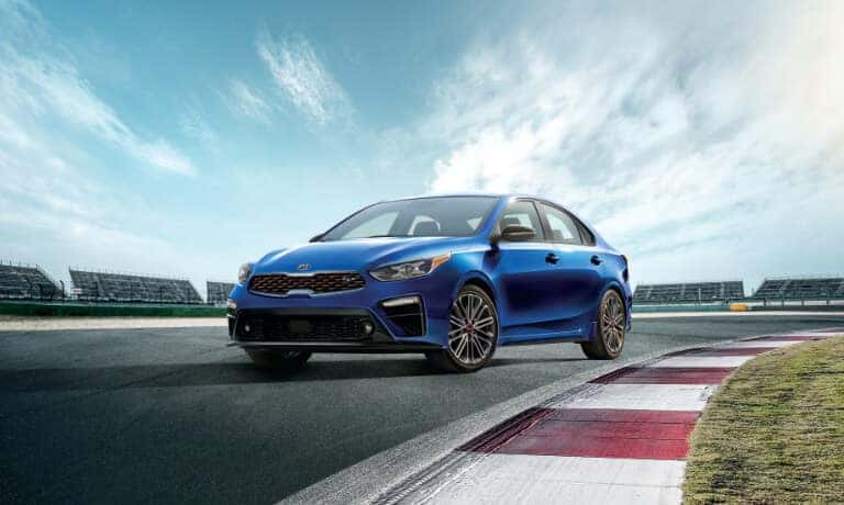 Kia Forte Driving On A Test Track