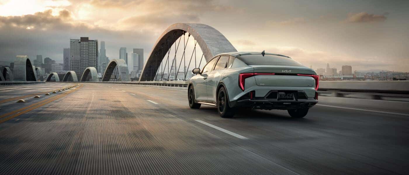 2025 Kia K4 Exterior Driving On Bridge To City