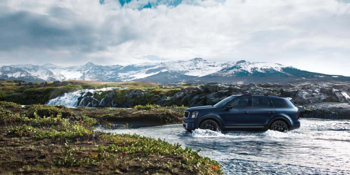 2025 Kia Telluride Exterior Driving Through Water Side View