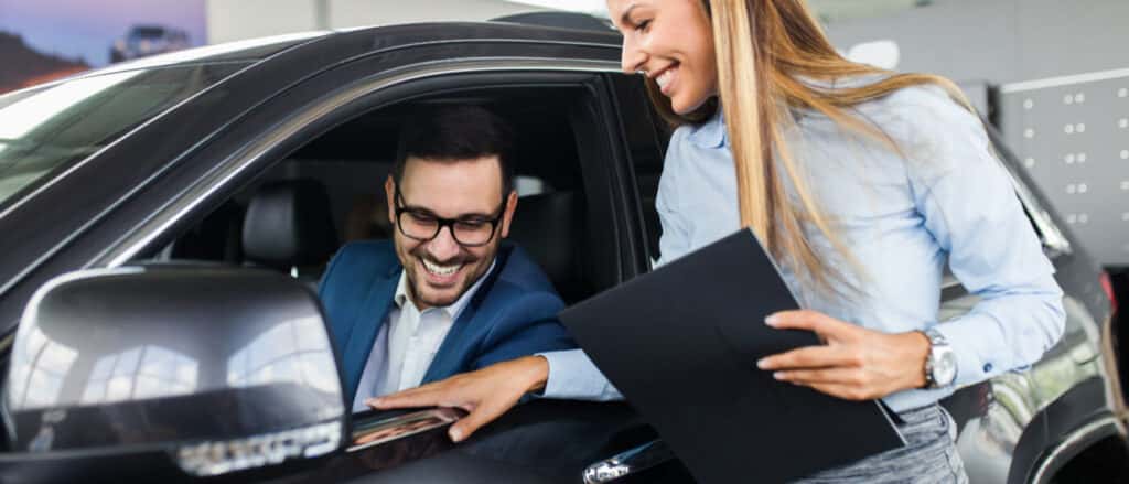 Finance Saleswoman With Customer