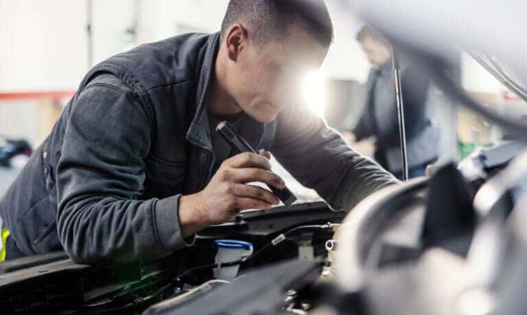 Service-Inspection-TechnicianFlashlightUnderHood