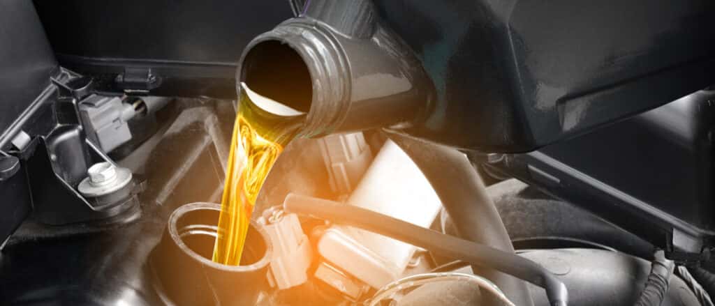 Service Oil Change Pouring Oil