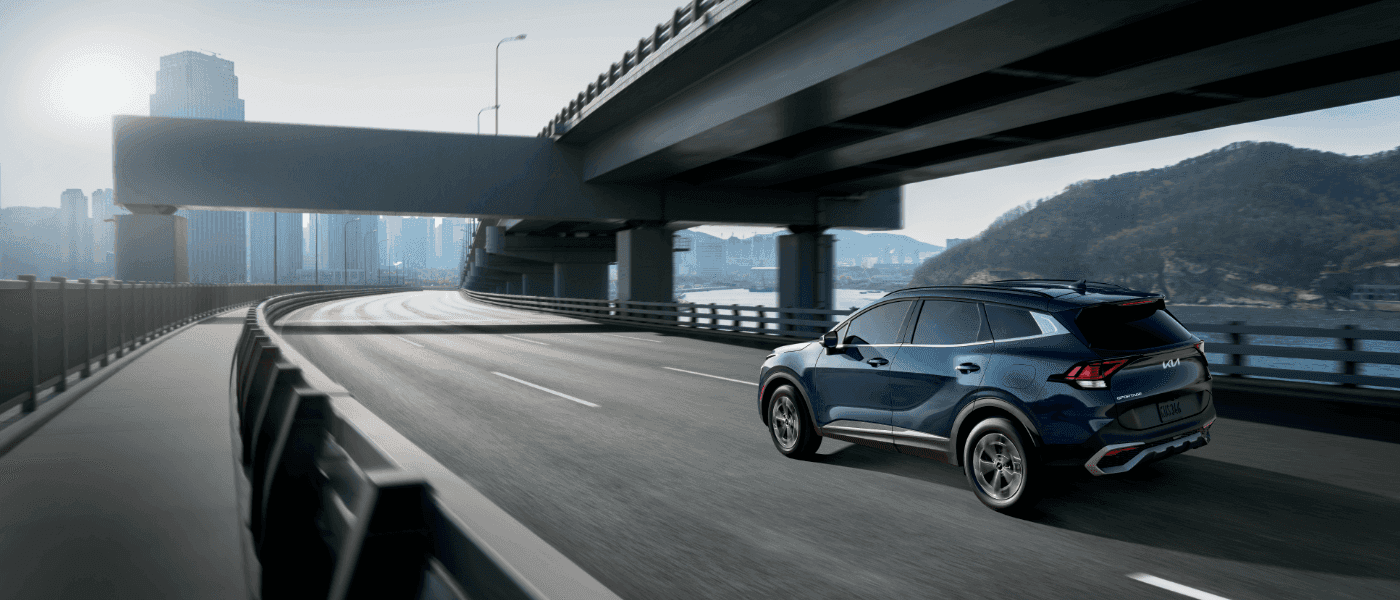 2025 Kia Sportage Hybrid Exterior Driving To City
