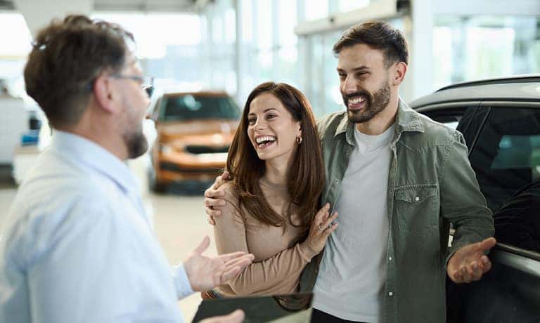 Southlake Kia Finance Happy Couple Buying Car