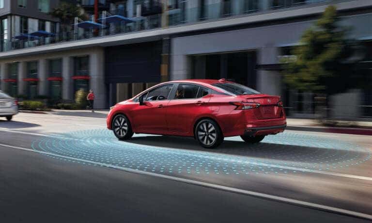 2020 Nissan Versa Exterior Driving In Town With Collision Sensors