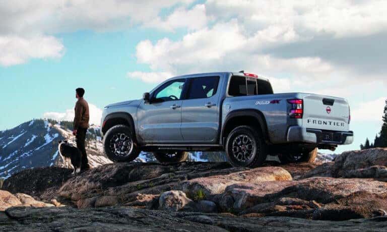 Nissan Frontier Exterior In Mountains With Hiker