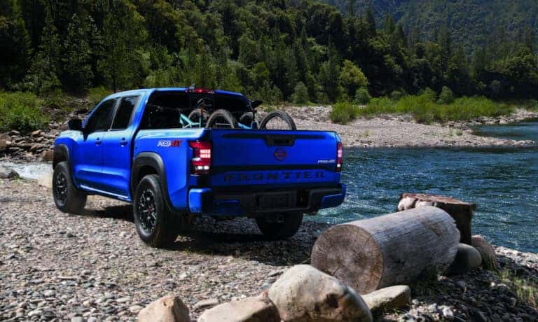2023 Nissan Frontier Exterior With Bikes In Back At Riverside Campground
