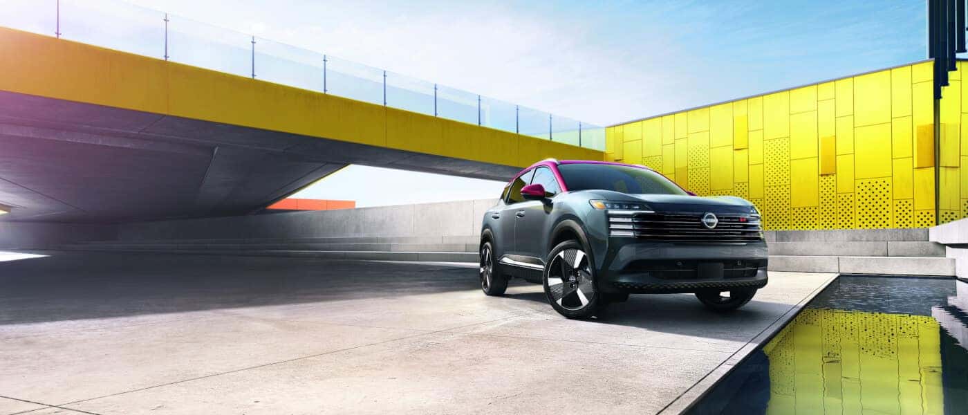 2025 Nissan Kicks Exterior Parked By Colorful Walkway