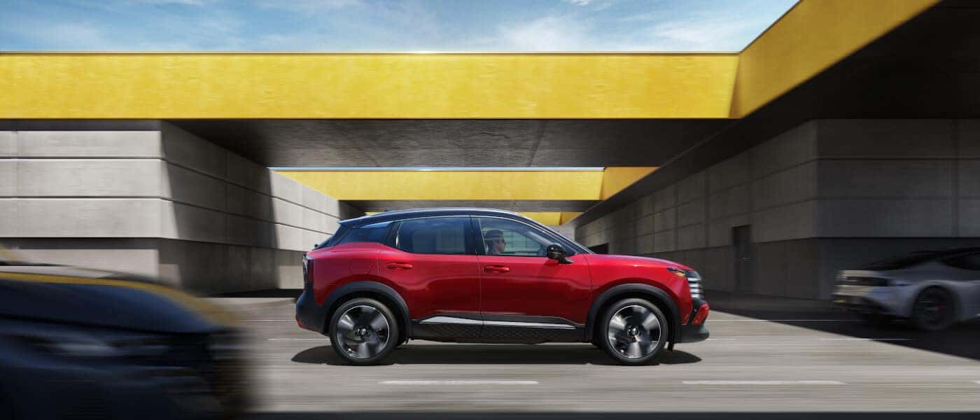 2025 Nissan Kicks Exterior Side Driving Underpass