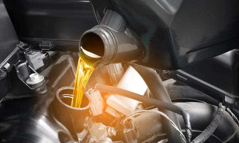 Service Oil Change Pouring Oil