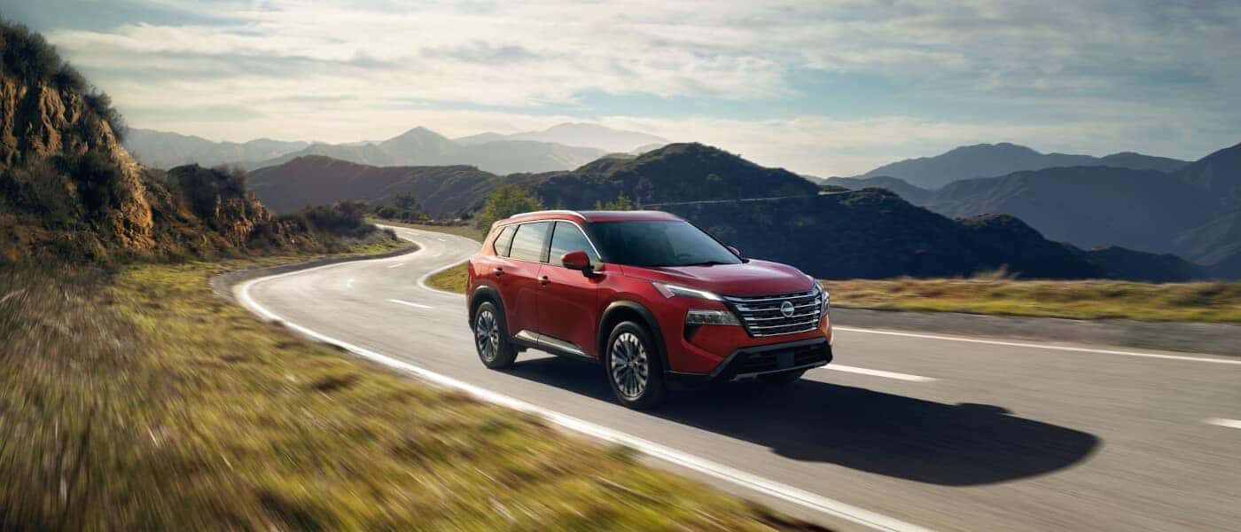 2025 Nissan Rogue Exterior Driving In Hills