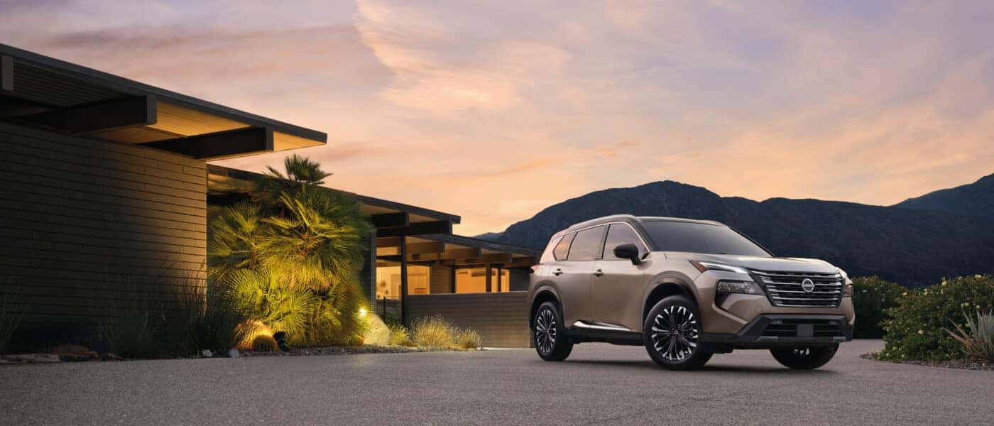 2025 Nissan Rogue Exterior Parked By Home At Sunset