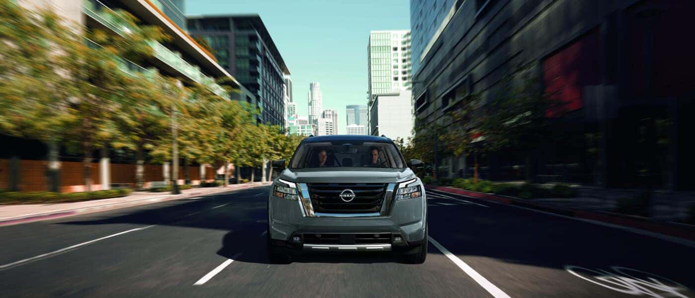 2025 Nissan Pathfinder Exterior Driving Head On In City
