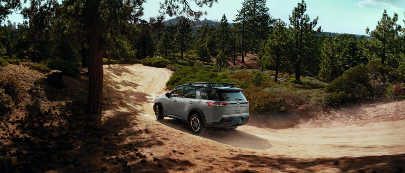 2025 Nissan Pathfinder Exterior Offroading On Forest Trail