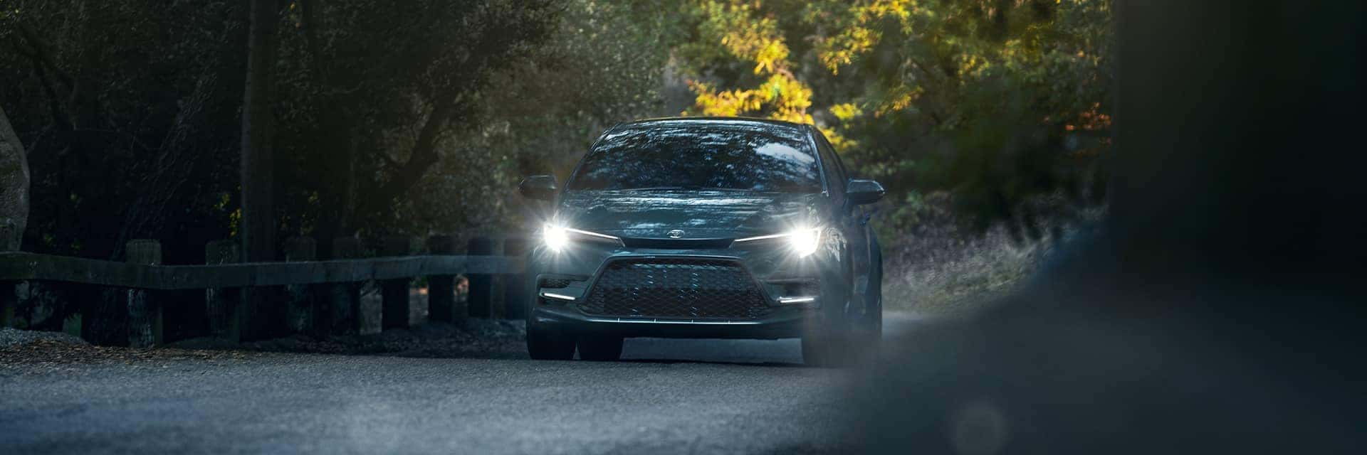 2026 gray toyota corolla driving at night