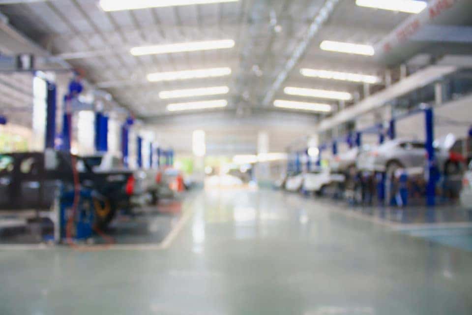 car repair service center blurred background