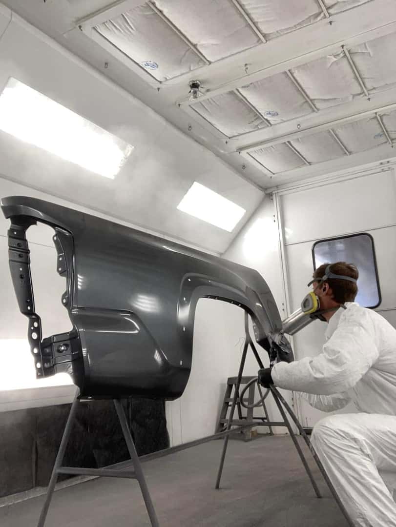 Body Panel Painting by Technician at Wareing Sheridan Chevrolet Collision Center