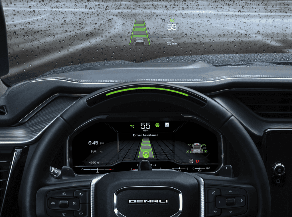 2026 GMC Sierra 1500 dashboard displaying GMC Pro Safety Plus active safety alerts and driver assistance indicators