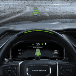 2026 GMC Sierra 1500 dashboard displaying GMC Pro Safety Plus active safety alerts and driver assistance indicators
