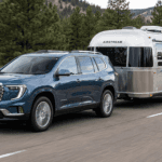 2026 GMC Acadia towing a trailer in Northern Colorado
