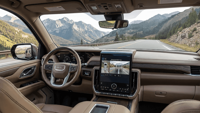 2026 GMC Yukon towing horse trailer in Colorado mountains
