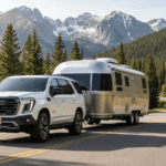 2026 GMC Yukon towing horse trailer in Colorado mountains