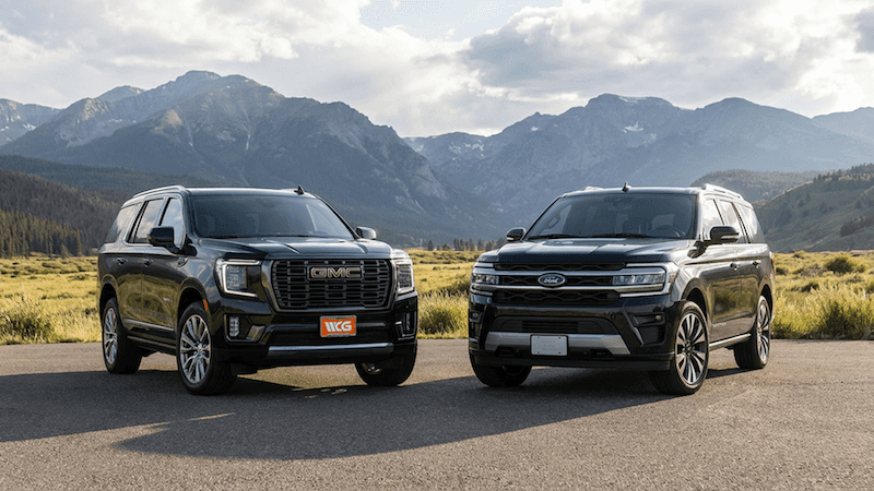 2026 GMC Yukon and Ford Expedition lineup comparison in Colorado mountains