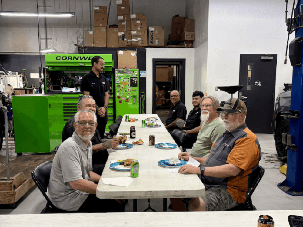 WCG service and parts team gathered in the shop for the appreciation lunch
