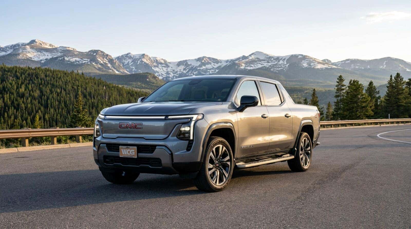 A 2026 GMC Sierra EV electric pickup on a Colorado mountain overlook at Weld County Garage GMC in Greeley