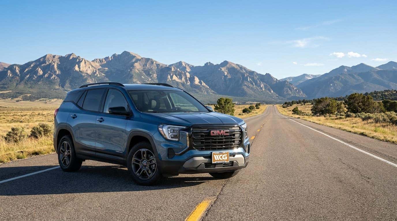2026 GMC Terrain on a Northern Colorado highway with Rocky Mountains in background