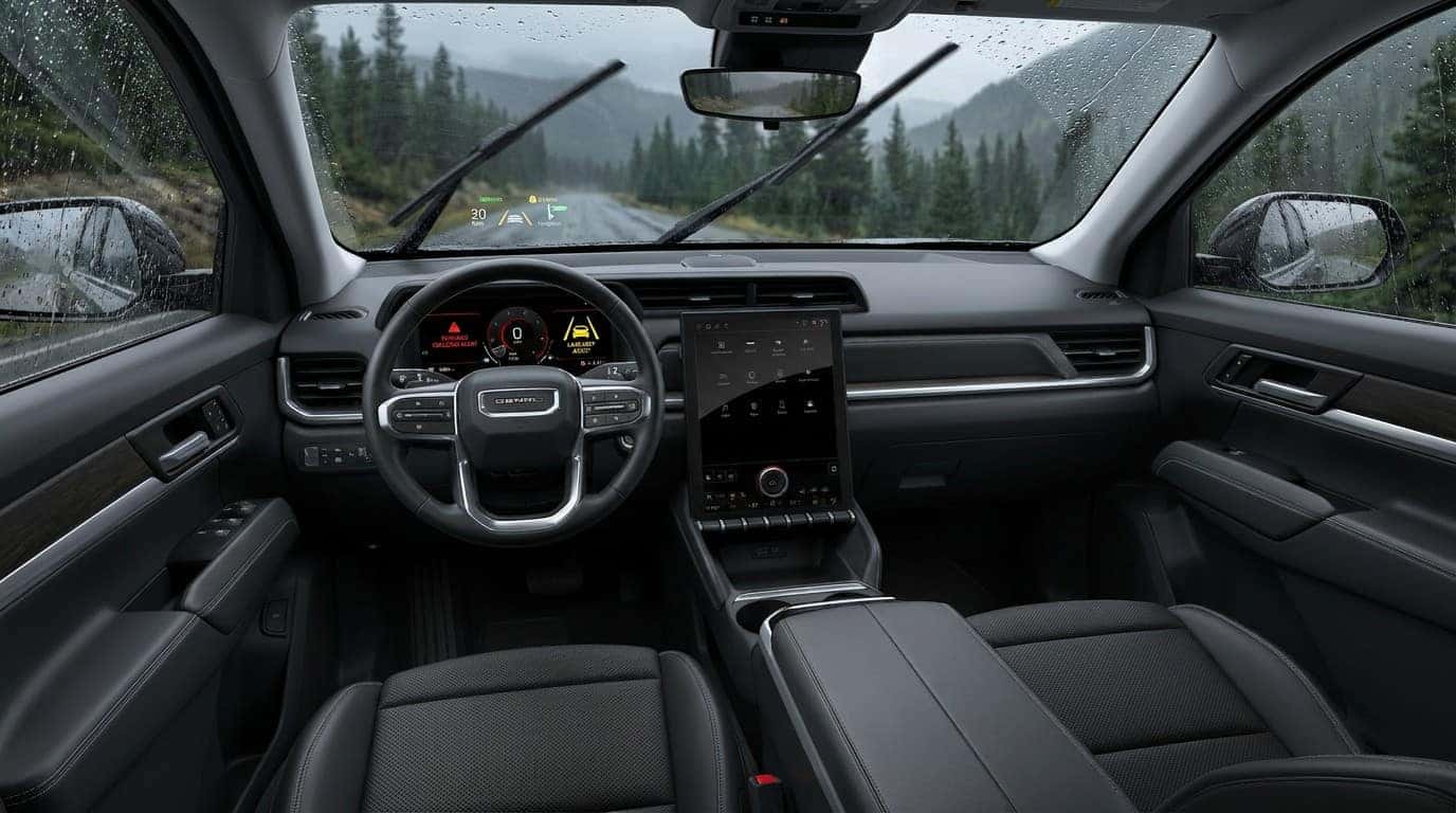 2026 GMC Terrain driver display showing safety alerts in rainy conditions
