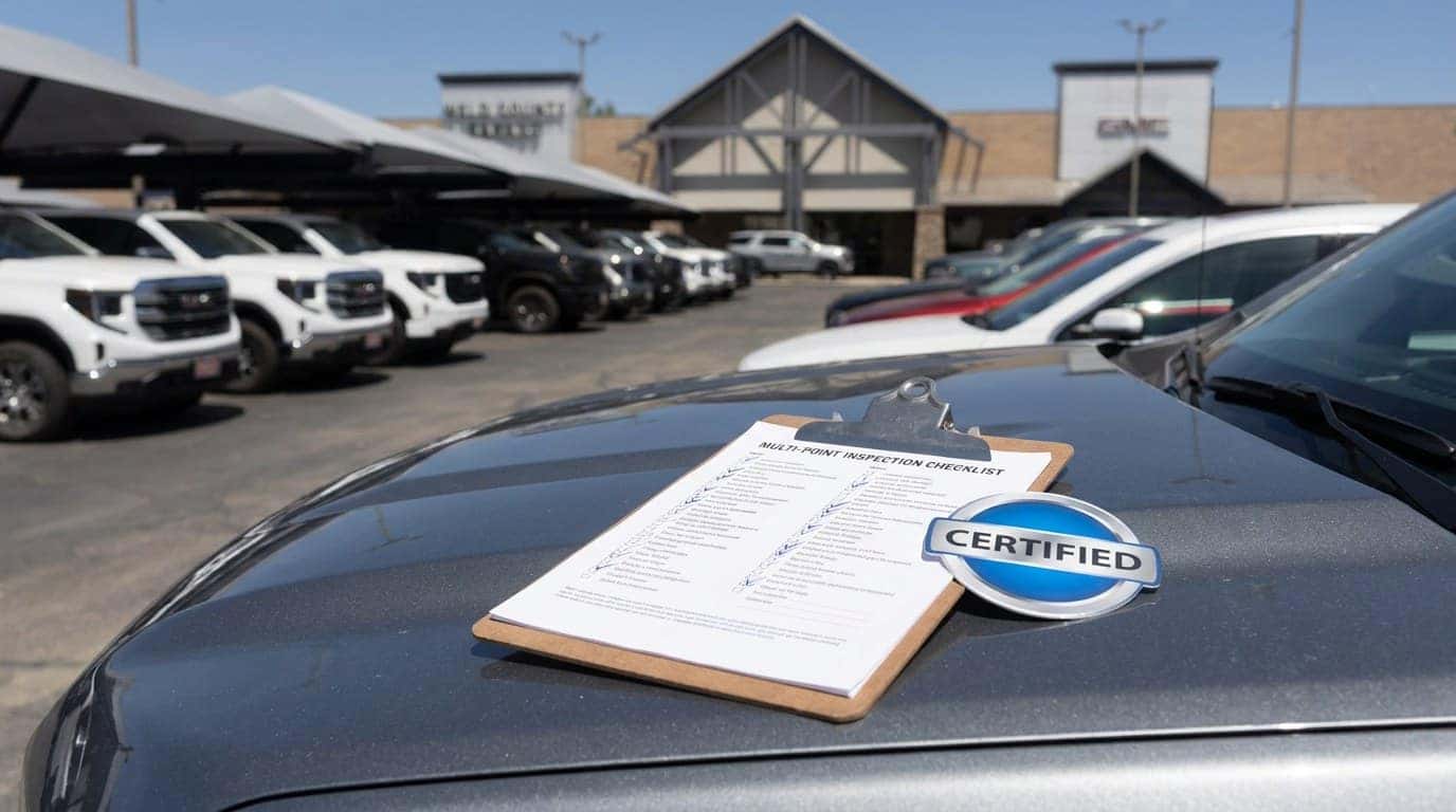 A Certified Pre-Owned badge next to the 172-point MPVI inspection checklist used on every used vehicle at Weld County Garage in Greeley