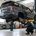 A WCG technician inspecting a used car
