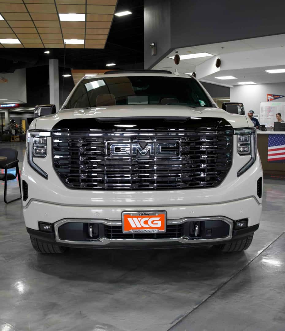White Frost 2026 GMC Sierra 1500 Denali Ultimate in the Weld County Garage GMC showroom in Greeley, Colorado